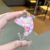 Nuevo llavero de muñeca de delfín con arena movediza relleno de aceite, colgante para mochila, decoración para bolso de pareja, regalo pequeño para venta al por mayor