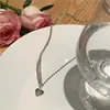 2023 nueva moda collar con colgante de amor diseño de nicho femenino cobre circonita cadena de clavícula de alta calidad venta al por mayor