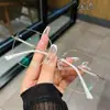 Novos óculos para presbiopia sem aro anti-luz azul óculos da moda com corte a laser para idosos populares no TikTok Óculos para presbiopia com incrustação de diamantes