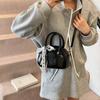 Casual Texted 2025 Nova Moda Estilo Ocidental Design Simples de Nicho Bolsa Shell de Ombro Transversal Feminina de Primavera