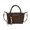 Bolso de mano tejido nuevo transfronterizo para mujer, bolso cuadrado pequeño de moda, sensación de alta gama, bolso de hombro único cruzado, bolso de moda versátil tipo dumpling