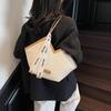 Bolsas para mulheres 2025 Novo estilo Bolsa tote de grande capacidade popular deste ano Bolsa de ombro casual de verão Bolsa de classe para estudantes universitários