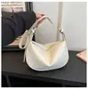 Bolso de PU estilo coreano nuevo para mujer, moderno y simple, bolso tipo empanada de alta gama y gran capacidad, bolsos de axila al por mayor