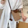 Nova Bolsa Transversal Estilo Balde de Nicho Verão 2026 Mini Palha Moda Bolsa para Celular Feminina Bolsa de Ombro Trançada