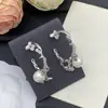 Brincos de Letra de Designer Réplica de Alta Qualidade Europeus e Americanos Transfronteiriços 2025 para Mulheres, Brincos de Trevo de Quatro Folhas Atacado