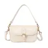 Bolso cuadrado pequeño retro, bolso de hombro para mujer, nuevo bolso de hombro de moda de nicho primavera 2026, adecuado para el trabajo y los desplazamientos, bolso cruzado