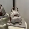 Otoño 2026 Nuevo de Moda Nicho Moda Versátil Lindo Dibujos Animados Simple Casual Elegante Bolso de Hombro Simple/Doble Asa