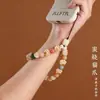 Raíz de Bodhi Cuentas Redondas Gato Asado Carbón Uña de Gato Lanyard para Teléfono Móvil para Mujeres Exquisito y Lindo Gato de la Suerte Corto para Muñeca Colgante Antiperdida Venta al por Mayor