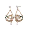 Pendientes Europeos y Americanos de Lujo Ligero con Perlas y Corazones Tachonados de Diamantes, Geométricos, Pendientes de Alta Gama Personalizados Transfronterizos, Accesorios para Orejas de Nicho de Instagram