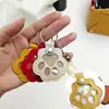 Lindo Elemento de Pata de Gato Colgante Portátil de Cuero, Bolsa para Guardar Pelo de Mascota Conmemorativo, Accesorio Versátil de Llave para el Día a Día