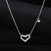 Cadena para clavícula elegante con microincrustaciones de circonita, chapada en oro real, diseño de nicho femenino, collar de amor, cadena para suéter exquisita y versátil para mujer