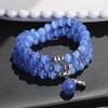 Qi Yi accesorios transfronterizos al por mayor pulsera de ópalo de cristal pulsera de tres círculos de ojo de gato Yiwu artículo pequeño Pulsera para mujer