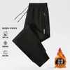 Pantalones de hombre para otoño e invierno con forro polar, elasticidad en cuatro direcciones, cremallera, múltiples bolsillos, cintura elástica, corte recto holgado, estilo jogger
