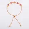 Pulsera de trébol de cuatro hojas con cruz de circonita para mujer, dulce, de alta gama, nicho, versátil para Instagram, joyería para mano con flor