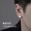 Aretes de botón de plata pura S999 con aguja y circonita de diamante redondo, sensación de lujo ligero y alta gama, aretes de nicho de moda para hombre, nuevo modelo de verano 2026