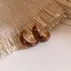 Pendientes de aro redondos con lunares y efecto de goteo de aceite estilo coreano ins, pendientes retro de alta gama de moda con un diseño único para mujer