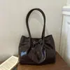 Bolso de mujer de temperamento de alta gama 2026 versátil moderno de alta clase bandolera de un solo hombro gran capacidad para el trabajo lujo ligero tote simple