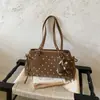 Bolso de mano cruzado 2026 nuevo, dulce y moderno para mujer, bolso de hombro, bolso de axila de lunares de alta apariencia para mujer