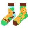 Calcetines originales de moda infantil AB color asimétrico dibujos animados longitud media otoño e invierno caramelos lindos calcetines de algodón para niños y niñas