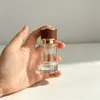 F090C-Decantador de Perfume Cilíndrico de Alta Calidad 30ML Botella de Perfume Portátil con Atomizador Botella Vacía Tapa de Rosca Tipo Presión
