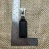 Tiradores de cremallera en stock, Cabezales de cremallera, Piezas de tirador de cremallera para zapatos, Botas, Bolsos, Hebillas de cremallera para ropa de PU