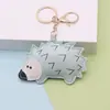 Colgante Llavero Erizo de Cuero PU de Moda Transfronterizo, Accesorio Decorativo Creativo para Bolsos y Mochilas, Venta al por Mayor desde Fabricante