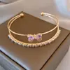 Pulsera Doble Fila con Lazo Incrustado de Circonita y Diamantes Transfronteriza, Sensación de Lujo Ligero y Gama Alta, Moda de Nicho y Joyería de Mano Elegante