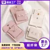 Exquisito juego de bolsas para guardar collares y pendientes al por mayor, bolsas de gamuza con botón de presión, bolsas de terciopelo de microfibra engrosado con logo en relieve