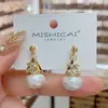 Pendientes de Perla Triangulares de Moda con Temperamento Coreano para Mujer Diseño de Nicho Personalidad Versátil Accesorios para Pendientes Pendientes de Tachuela para Viajes Cotidianos Celebridad de Internet