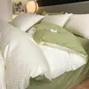 Juego de cuatro piezas de jacquard de algodón de fibra larga de lujo ligero de alta gama, sábana de algodón puro, funda de edredón, sábana bajera, ropa de cama para hotel y casa de huéspedes