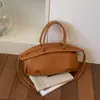 Bolsa Nueva de Mujer Primavera 2026 Transfronteriza con Diseño de Nicho, Textura de Alta Calidad, Estilo Sencillo, Bolso de Hombro, Bolso de Axila, Bolso Cruzado, Bolso Tote