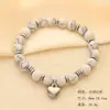 Venta Caliente de Amazon Pulsera de Piedra Ojo de Gato Cebra en Polvo Turquesa con Cuentas Pulsera con Colgante de Acero Inoxidable Amor Venta al por Mayor Transfronteriza