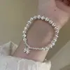 Pulsera con espaciador de plata de ley S925 de cuerpo completo cepillada de industria pesada, ojo de gato, lazo, para mujer, lujo ligero, sentido de alta gama, pulsera de cuerda elástica