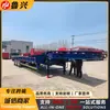 Semirremolque plataforma baja de 3 ejes en stock para transporte de equipo de construcción grande