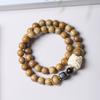 Sándalo verde peral negro sándalo dorado anillo DIY pulsera de león hombres y mujeres rosario joyería pulsera fabricantes mayoreo