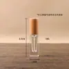 Botellas de muestra de perfume de alta gama, portátiles, de 10 ml, con atomizador de bomba, botellas de spray de vidrio, botellas recargables y tapas de madera