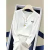 Camiseta de Manga Larga Abotonada con Cuello en V Nueva de Otoño 2026 para Mujer, Algodón con Diseño de Copos de Nieve, Versátil, Moderna, Juvenil, Elegante