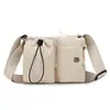 Bolso de hombro de nailon nuevo 2026 para mujer, bandolera simple y casual, gran capacidad, versátil para ir al trabajo y con estilo deportivo.