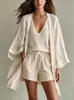 Conjunto informal de tres piezas para mujer, estilo nuevo 2026, transfronterizo europeo y americano, cárdigan holgado de longitud media, chaleco sin mangas, shorts