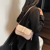 Novedad 2025 bolso baguette moda retro para mujer bolso de hombro cruzado para el trabajo costura texturizada bolso de mujer simple y moderno