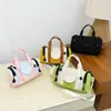 2026 Nuevo Bolso Redondo Cilíndrico de Bloques de Color de Moda Bolso de Mano Hombro Cruzado Bidireccional Multifuncional Casual Versátil para el Trabajo Bolso de Mujer Bolso de Mamá