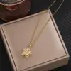 Nuevo Collar con Colgante de Bauhinia Giratorio de Circonita para Mujer, Nicho Versátil, Cadena para Clavícula de Gama Alta, Venta al por Mayor de Fábrica