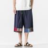 Pantalones casuales sueltos de lino y algodón de estilo chino de talla grande de verano 2024 para hombre, pantalones cortos japoneses, pantalones de playa neutros