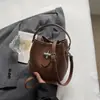 2026 Outono Inicial Nova Bolsa Saco Estilosa Cor Sólida Transversal de Ombro Bolsa de Mão Portátil Popular da Moda Personalizada