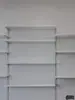 Tienda de ropa blanco y negro tira vertical de pilar A tienda de telefonía móvil estante de tira de tarjetas montado en la pared vitrina columna de escalera de doble orificio engrosada de tira vertical