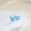Brincos de Bioporcelana Coloridos, Piercing de Cerâmica Pura Passepartout, Agulhas de Bioporcelana, Atacado de Fábrica de Brincos Hipoalergênicos