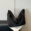 Bolso tote de gran capacidad modelo nuevo 2026 transfronterizo, bolso de hombro versátil de color sólido, adecuado para el uso diario, bolso de axila, bolso cruzado
