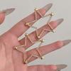 Pendientes de pentagrama hueco con diamantes de imitación de Corea del Sur Dongdaemun, sencillos y combinables, para mujer, con aguja de plata 925.
