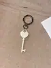 Colgante de Cabeza de Llave Igual de Blogger Ins Coreano Candado de Corazón Dorado Llavero Colgante de Bolsa Llavero de Pareja