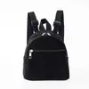 Mini mochila transfronteriza personalizada en colores lisos, mochila de pana de moda, mochila pequeña casual simple para hombres y mujeres